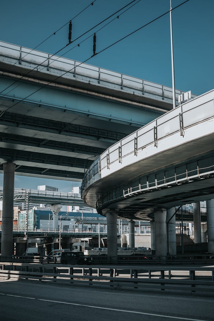A detailed view of a steel overpass in an urban city, showcasing modern infrastructure.